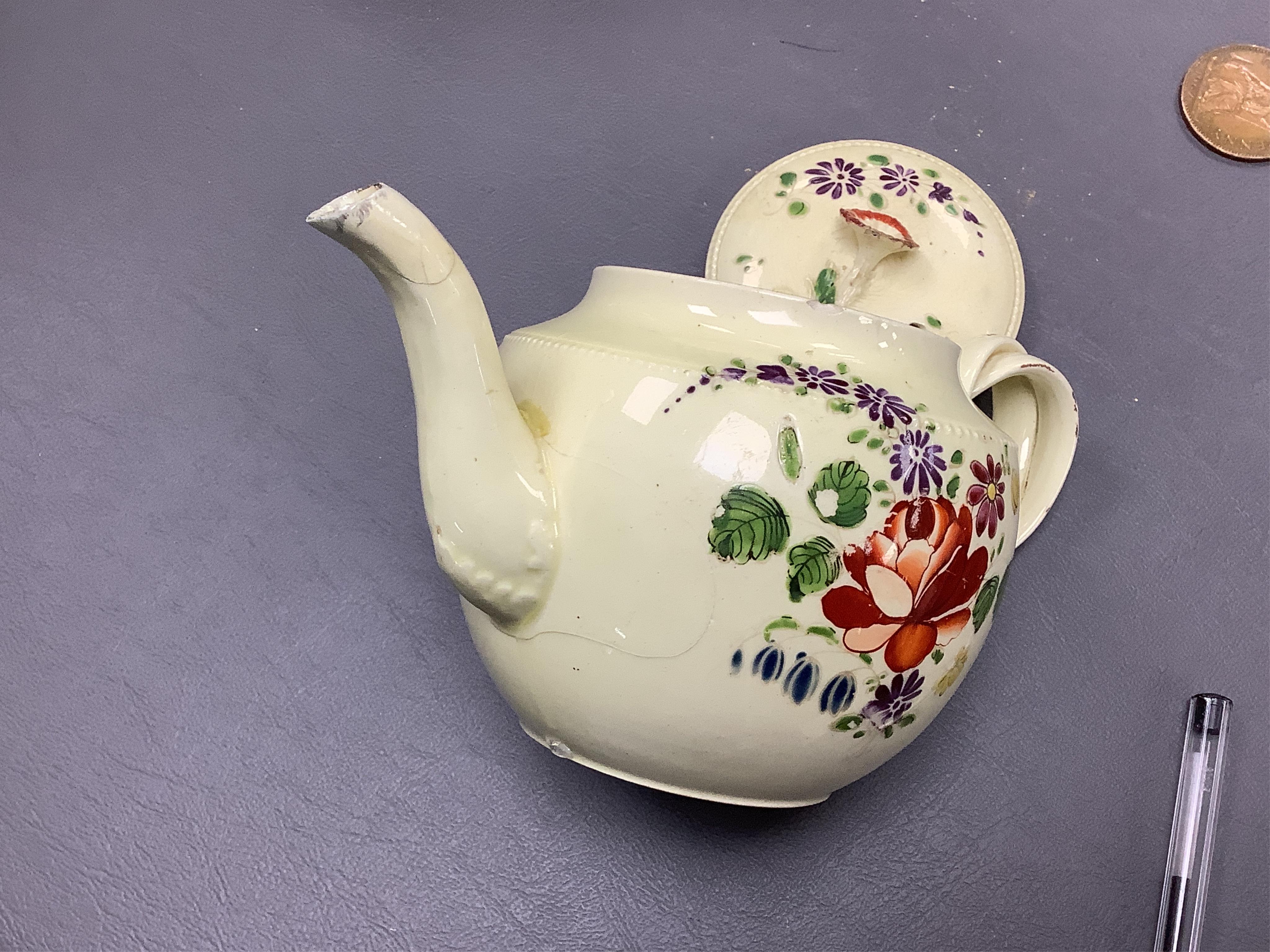Two George III creamware teapots and a lidded sugar bowl, c.1780, largest 20cm wide